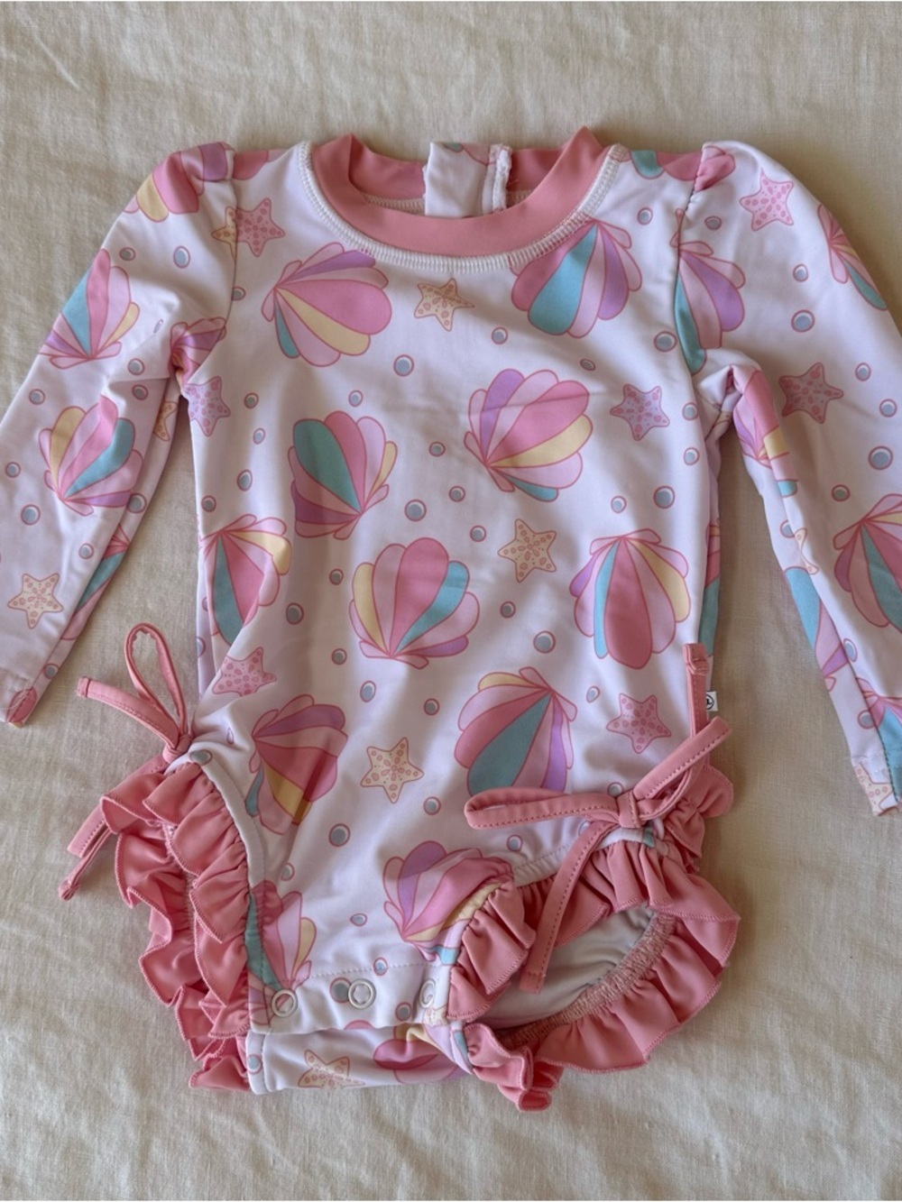Caden Lane Long Sleeve Rash Guard Ruffle Bottom Swimsuit Seashell Print